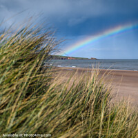Buy canvas prints of A rainbow over Luananbay beach by Joe Dailly