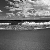 Buy canvas prints of Lone pebble on a monochrome beach by Joe Dailly