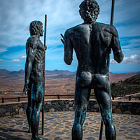 Buy canvas prints of Fuertaventura Statues Guise and Ayose by Joe Dailly