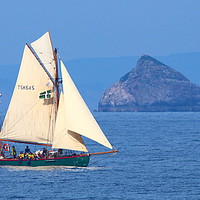 Buy canvas prints of Moosk passing Thatcher Rock by Tom Wade-West