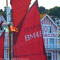 Buy canvas prints of Red Sails Passing Dartmouth Waterfront by Tom Wade-West