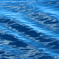Buy canvas prints of Ripples on a glassy sea. by Tom Wade-West