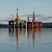 Buy canvas prints of Oil Rigs on the Cromarty Firth by Rhonda Surman