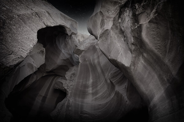 Antelope Canyon rock formation in Arizona during early night  Picture Board by Thomas Baker