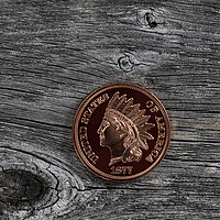 Buy canvas prints of Single US Indian head one cent coin on rustic wood for numismati by Thomas Baker