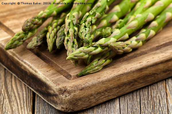Fresh Asparagus on rustic wooden server board Picture Board by Thomas Baker