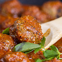Buy canvas prints of Freshly cooked meatballs in red sauce  by Thomas Baker