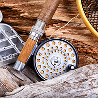 Buy canvas prints of Vintage fly fishing outfit and gear on rocks and w by Thomas Baker