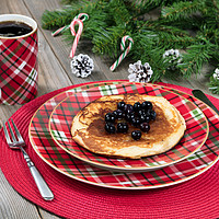 Buy canvas prints of Pancake breakfast for Christmas day with evergreen by Thomas Baker