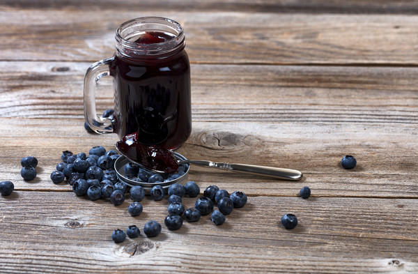 Fresh blueberry jam and berries with glass jar on  Picture Board by Thomas Baker