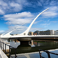 Buy canvas prints of Modern cable bridge over the River Liffey in Irela by Thomas Baker