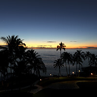 Buy canvas prints of Sunset with faint stars in big island of Hawaii plus burning tor by Thomas Baker