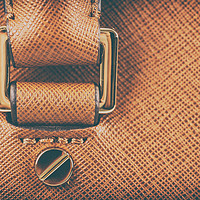 Buy canvas prints of Brown Leather Woman Bag Closeup by Radu Bercan