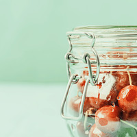 Buy canvas prints of Jar Of Red Fresh Cherries by Radu Bercan