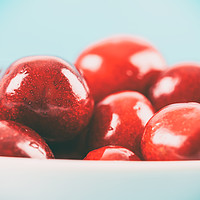 Buy canvas prints of White Bowl Of Fresh Red Cherries by Radu Bercan