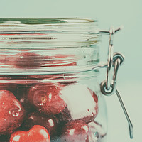Buy canvas prints of Jar Of Red Fresh Cherries by Radu Bercan