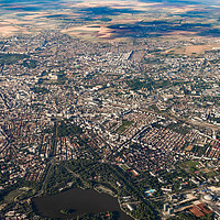 Buy canvas prints of Aerial View Of Bucharest City In Romania by Radu Bercan
