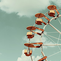 Buy canvas prints of Ferris Wheel In Fun Park On Blue Sky by Radu Bercan