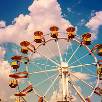 Buy canvas prints of Ferris Wheel In Fun Park On Blue Sky by Radu Bercan
