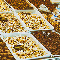 Buy canvas prints of Nuts, Pistachio, Almonds And Peanuts For Sale In F by Radu Bercan