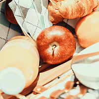 Buy canvas prints of Juice Bottle, Peaches, Apple, Orange And Croissant by Radu Bercan
