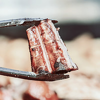 Buy canvas prints of Preparing Steaks On Barbecue Day by Radu Bercan
