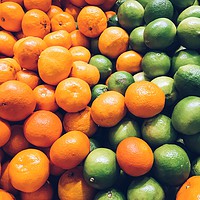 Buy canvas prints of Lime And Tangerines Citrus Fruits In Fruit Market by Radu Bercan