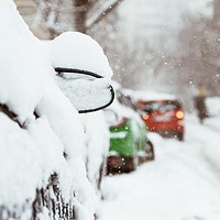 Buy canvas prints of Cars Covered With Fresh White Snow After A Heavy B by Radu Bercan
