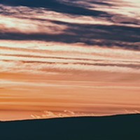 Buy canvas prints of Beautiful Sunset Cloudy Sky Over Mountains by Radu Bercan