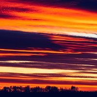 Buy canvas prints of Beautiful Red And Orange Summer Sunset Sky by Radu Bercan