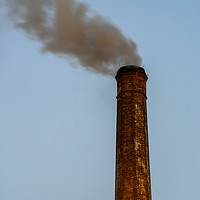 Buy canvas prints of Industry Smoke Pollution From Factory Chimney by Radu Bercan