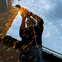 Buy canvas prints of Muliple sparks during metal cutting by Massimo Lama