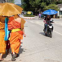 Buy canvas prints of Monks in Laos by Massimo Lama