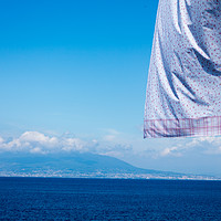 Buy canvas prints of neapolitan coast fron Sorrento with hanging clothes by Massimo Lama