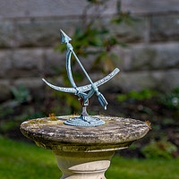 Buy canvas prints of Garden Sun Dial by Jim Wood
