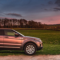 Buy canvas prints of Evoque Sunset by AMANDA AINSLEY