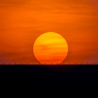 Buy canvas prints of The Setting Sun by AMANDA AINSLEY