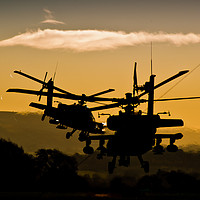 Buy canvas prints of Apache Gunships at Sunset by Charles Little