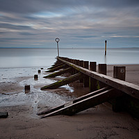 Buy canvas prints of Portobello Beach and groyne at Dusk by Stephen Lipton