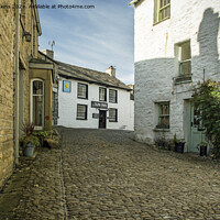 Buy canvas prints of Cobbled Street running through Dent Village  by Nick Jenkins
