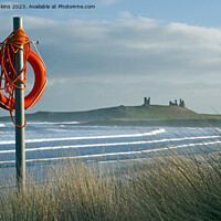 Buy canvas prints of Lifebuoy and Dunstanburgh Castle Embleton Beach No by Nick Jenkins