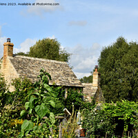 Buy canvas prints of Stone Cottage in the Cotswolds Village of Guiting Power Gloucestershire by Nick Jenkins