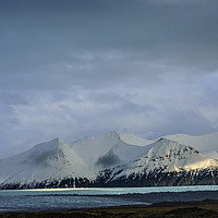 Buy canvas prints of Snow Covered Mountains Iceland by Nick Jenkins