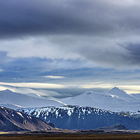 Buy canvas prints of Snow covered mountains south Iceland by Nick Jenkins