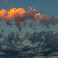 Buy canvas prints of Sun Dancing Evening Clouds by Nick Jenkins