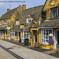 Buy canvas prints of Main Road through Broadway Cotswolds AONB by Nick Jenkins