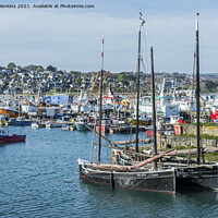 Buy canvas prints of Newlyn Harbour with boats of all shapes and sizes  by Nick Jenkins