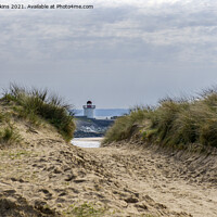 Buy canvas prints of Burry Port Lighthouse between the sand dunes  by Nick Jenkins