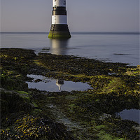 Buy canvas prints of Penmon Lighthouse Reflection by Eric Pearce AWPF