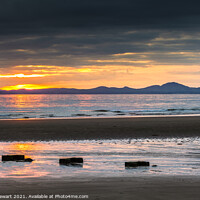 Buy canvas prints of Sunset from Harlech Beach in North Wales by Heidi Stewart
